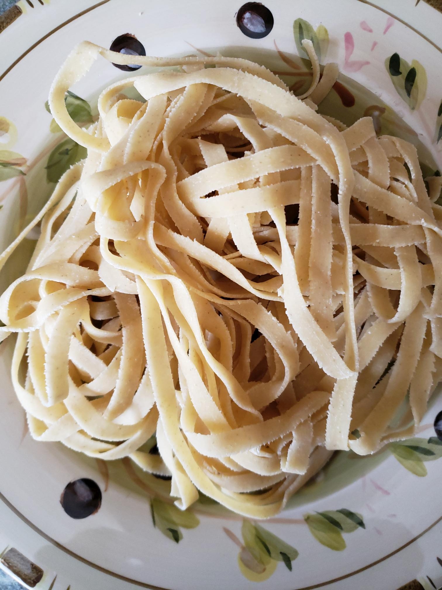 a plate of raw fettuccine